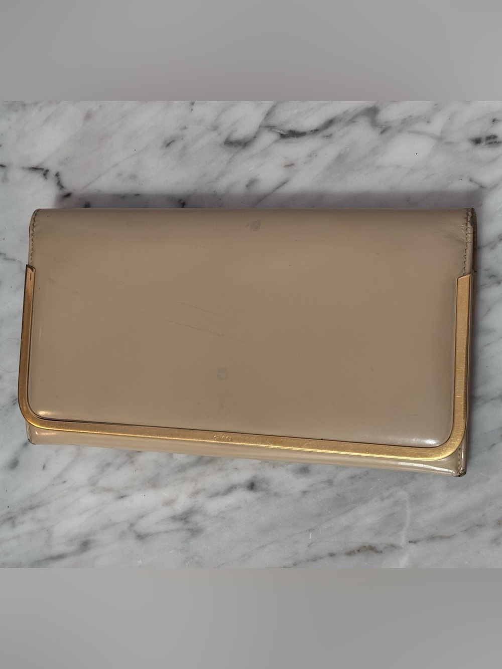 Gucci Beige Clutch with Gold Accent